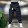 Pantaloni cropped moderni, cu croială relaxată, versatili, cu patchwork